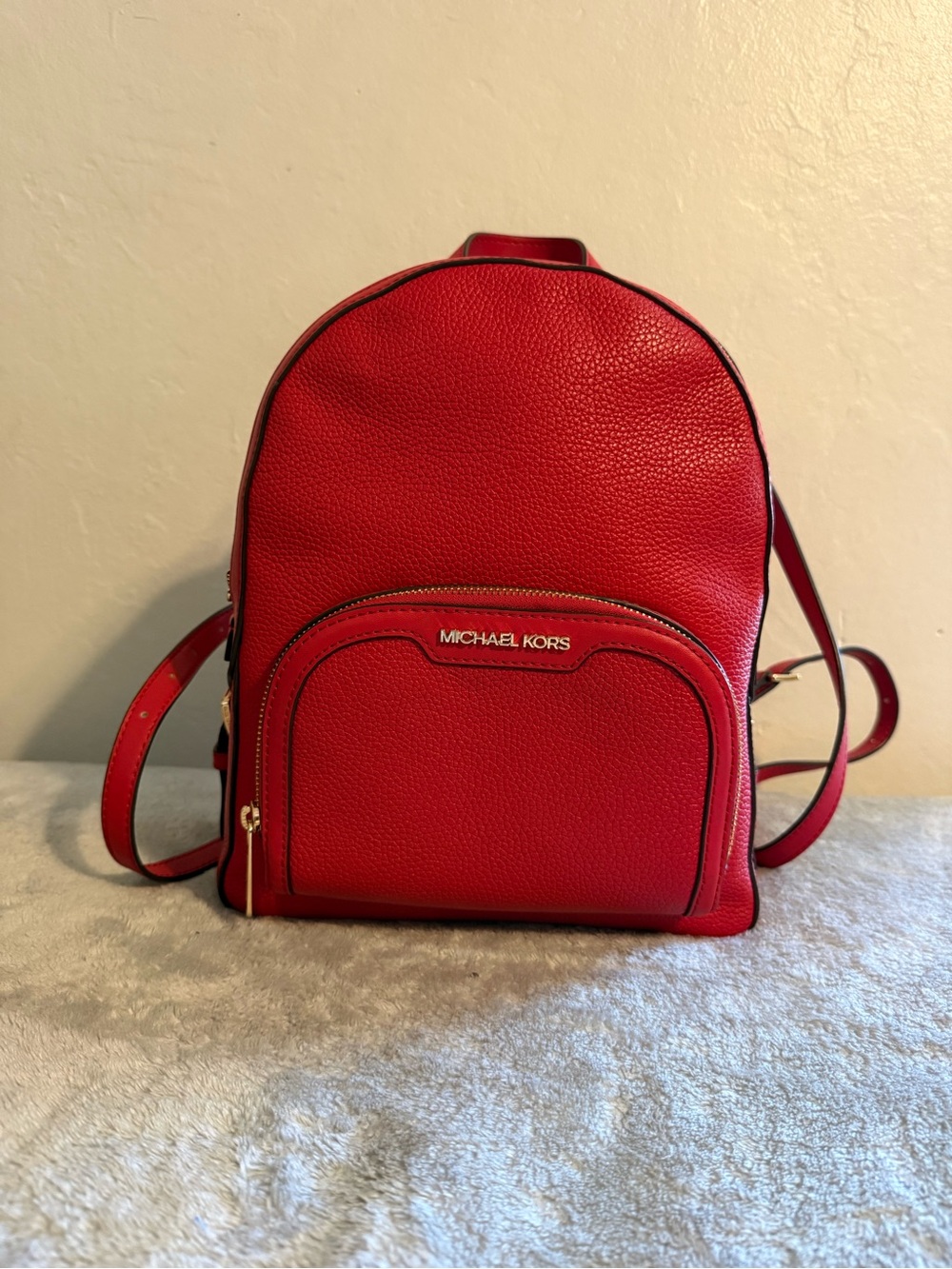 Michael Kors Red Pebbled Leather Mini Backpack with Front Zip Pocket